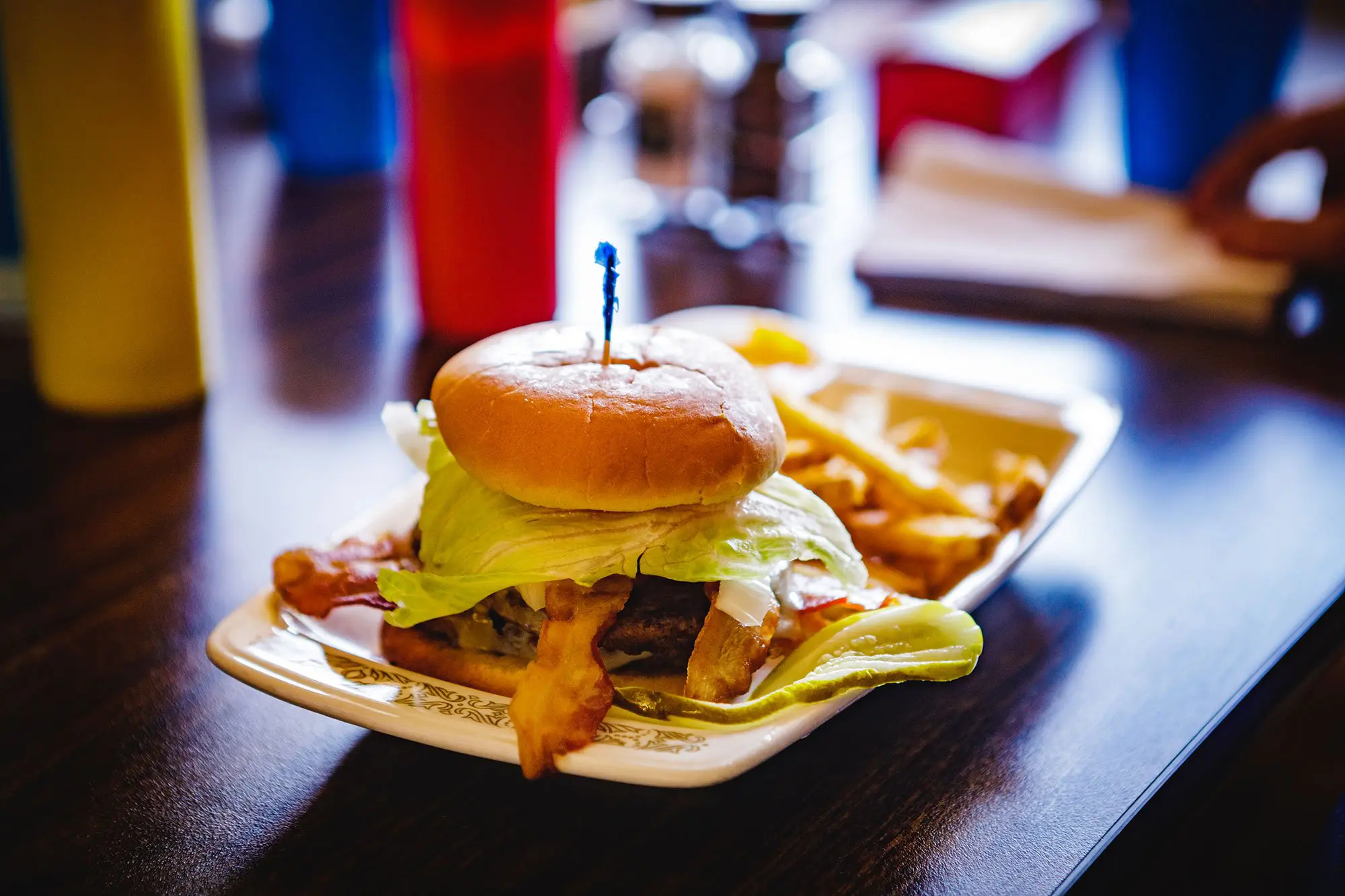 Bacon cheeseburger and french fries on sale at the Meramec Caverns restaurant