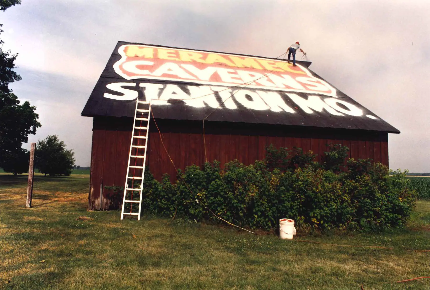 Advertisement for the Caverns were being painted on the roof of a barn