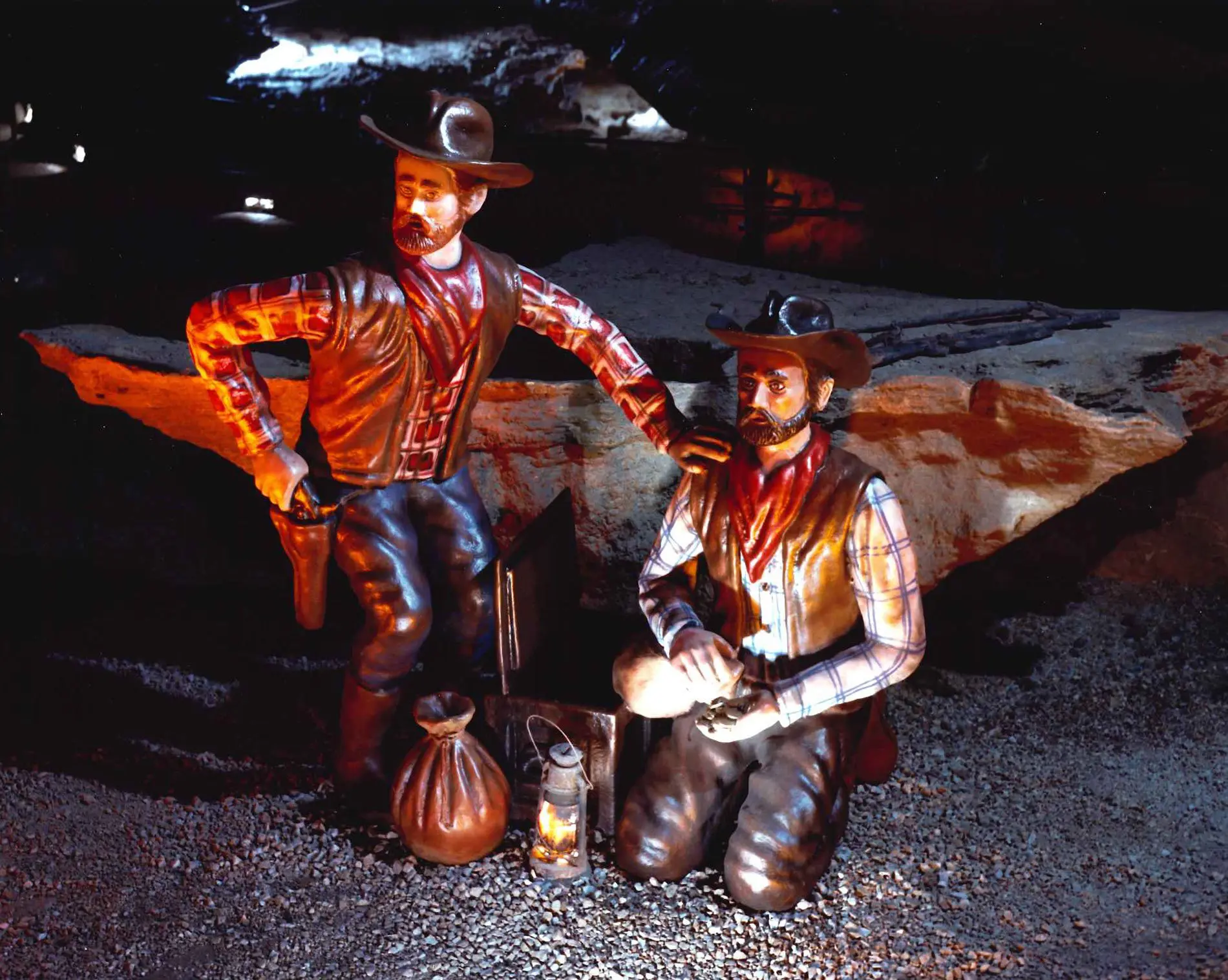Sculpture of Jesse James and Frank James and their loot from a bank robbery